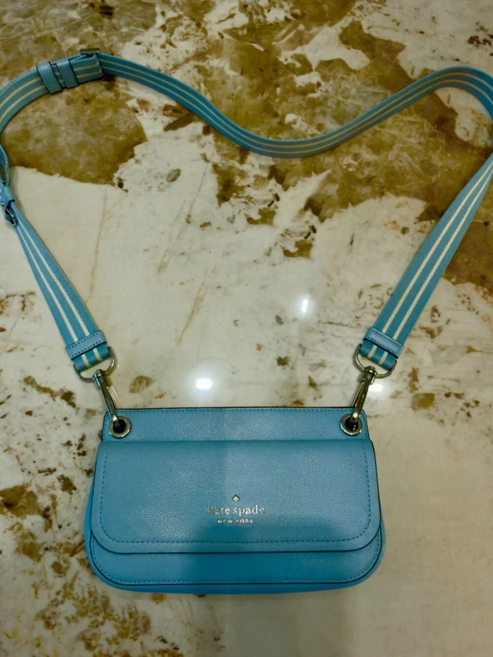 Kate Spade New York crossbody bag in light blue with coin pouch